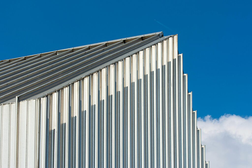 Learn about top roofing choices for timber frame structures. Discover the durability and style of composite shingles and coloured steel sheets, along with practical maintenance advice.